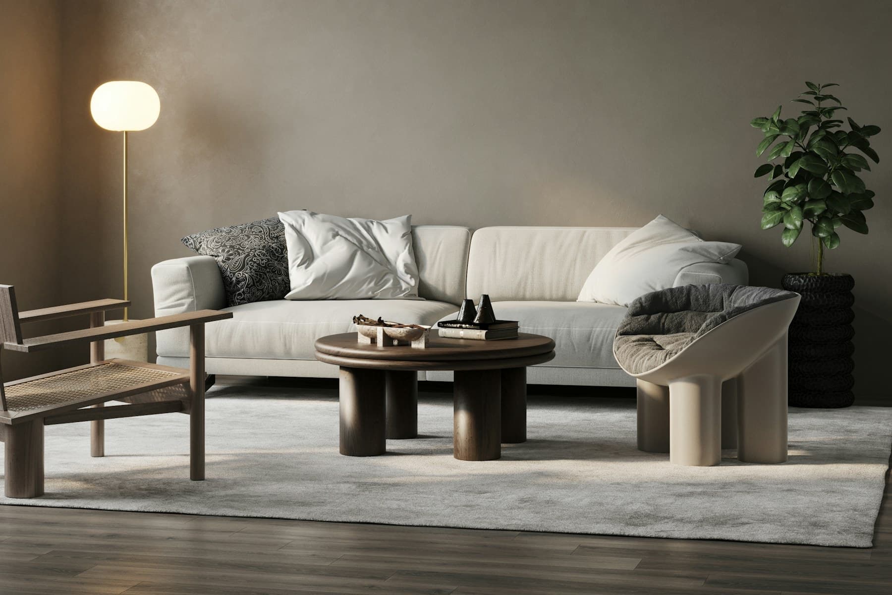 Living room of The Courtyard House — oak furniture, cane armchair and soft plaster walls in morning light