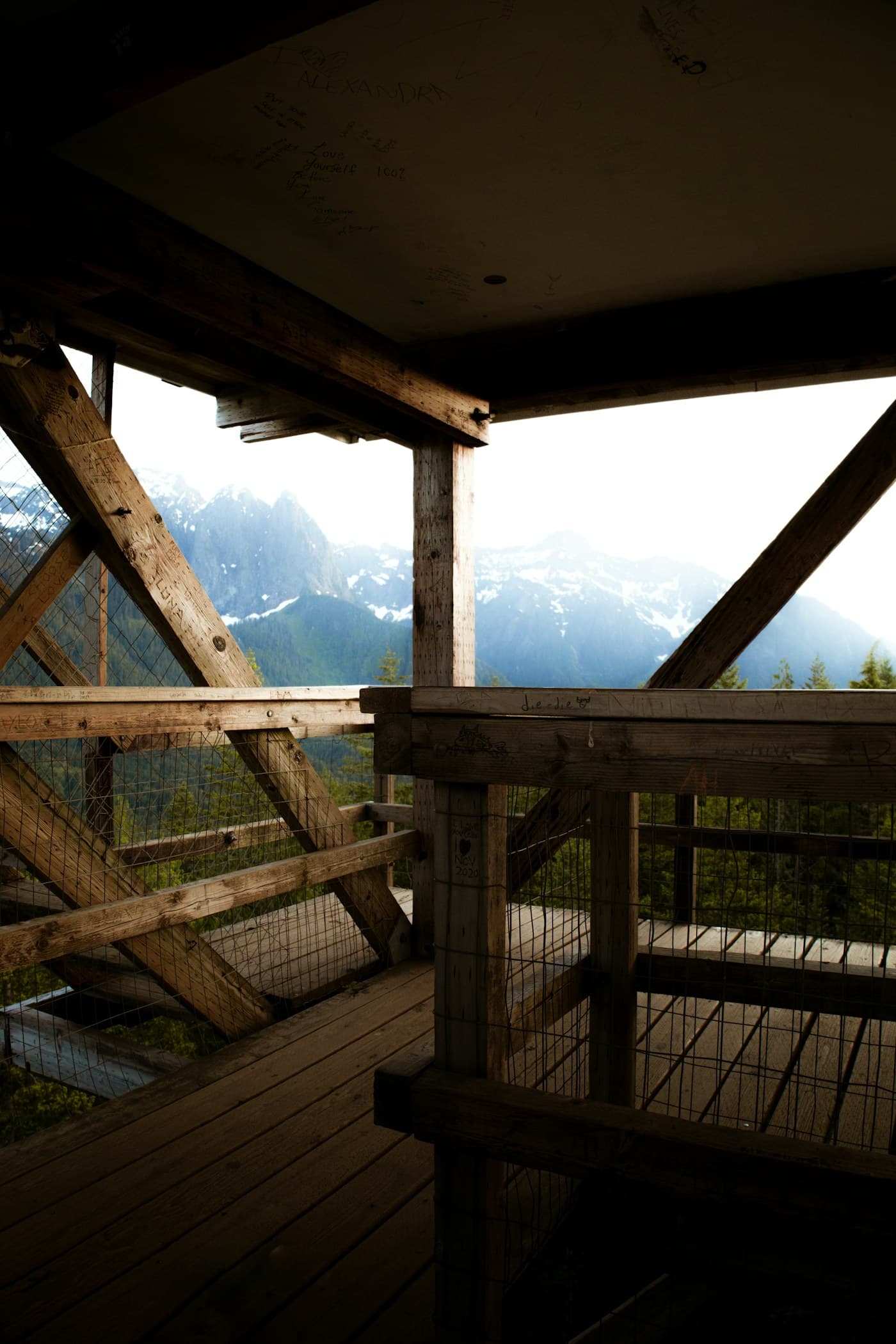 Wooden deck looking out across the valley at dusk